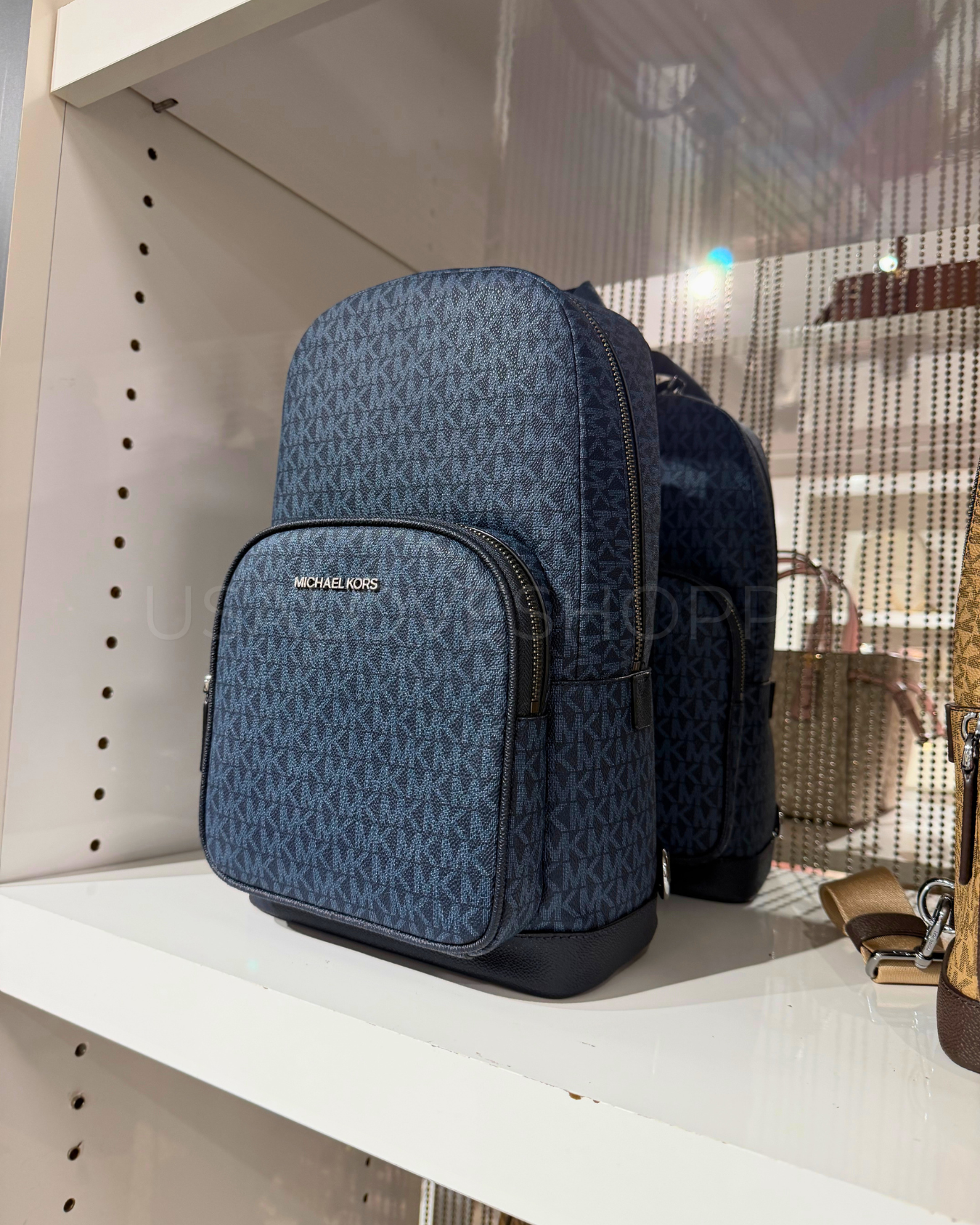 Michael Kors Men's Cooper Commuter Slingpack in Signature Admiral Pale Blue: The Stylish Everyday Companion for Modern Men