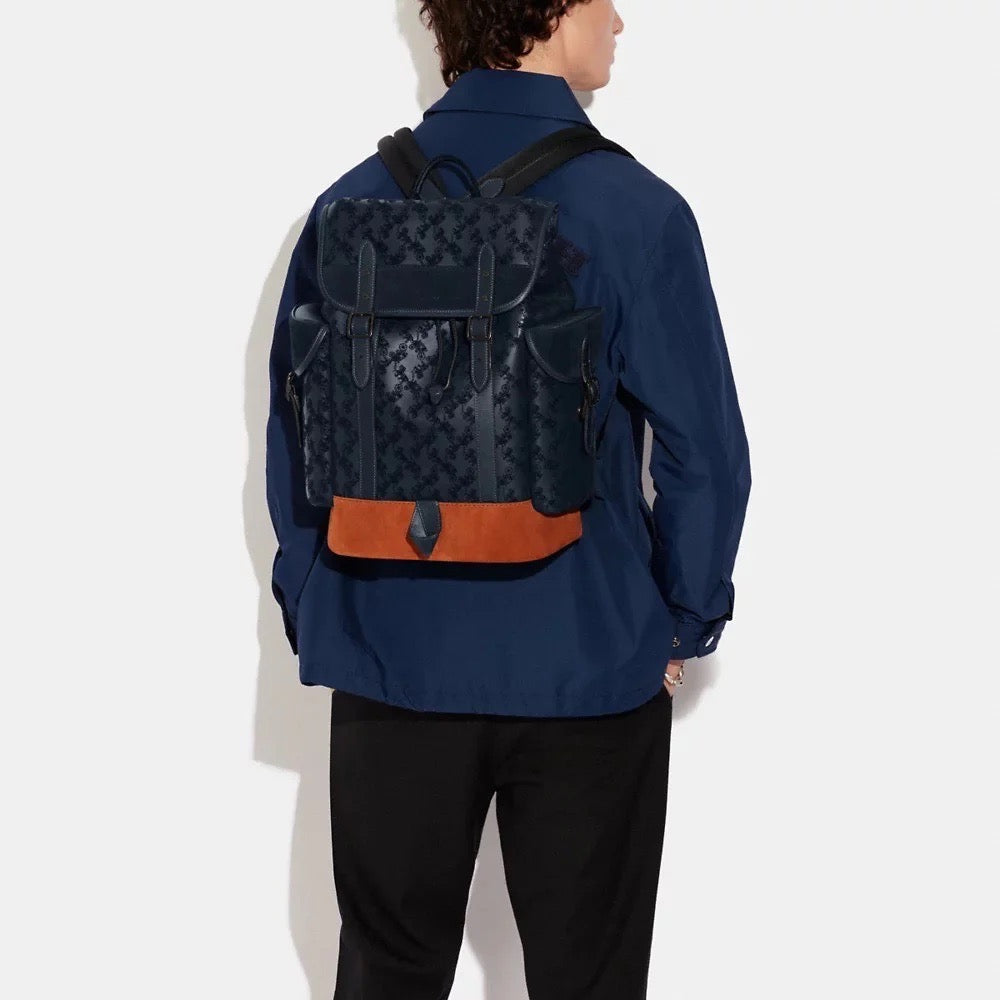 coach hitch backpack with horse and carriage print Club de Mode Signature coated canvas printed coated canvas and refined pebble leather Inside zip and multifunction pockets Double zip closure fabric lining Handle with 2 1/4 drop Outside zip pocket Adjustable shoulder straps 10 3/4 (L) x 12 1/2 (H) x 4 3/4 (W) Style No. Unveiling the Coach Hitch Backpack