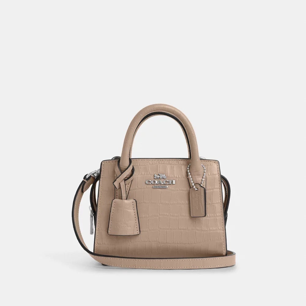 Discover the Exquisite Coach Andrea Mini Carryall in Stone – A Timeles