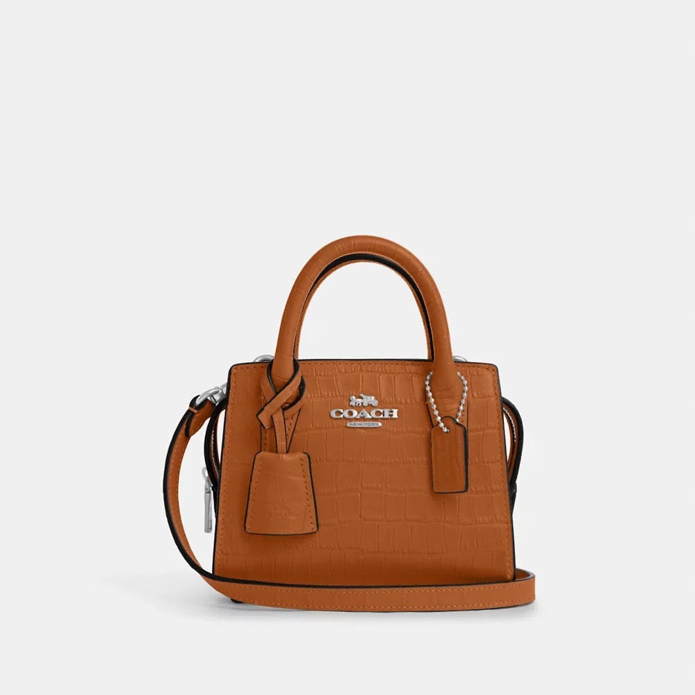 Discover the Exquisite Coach Andrea Mini Carryall in Washed Orange: A