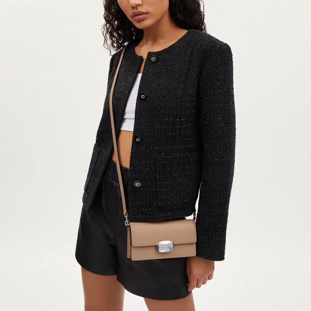 Discover Elegance with the Coach Eliza Small Flap Crossbody in Taupe!