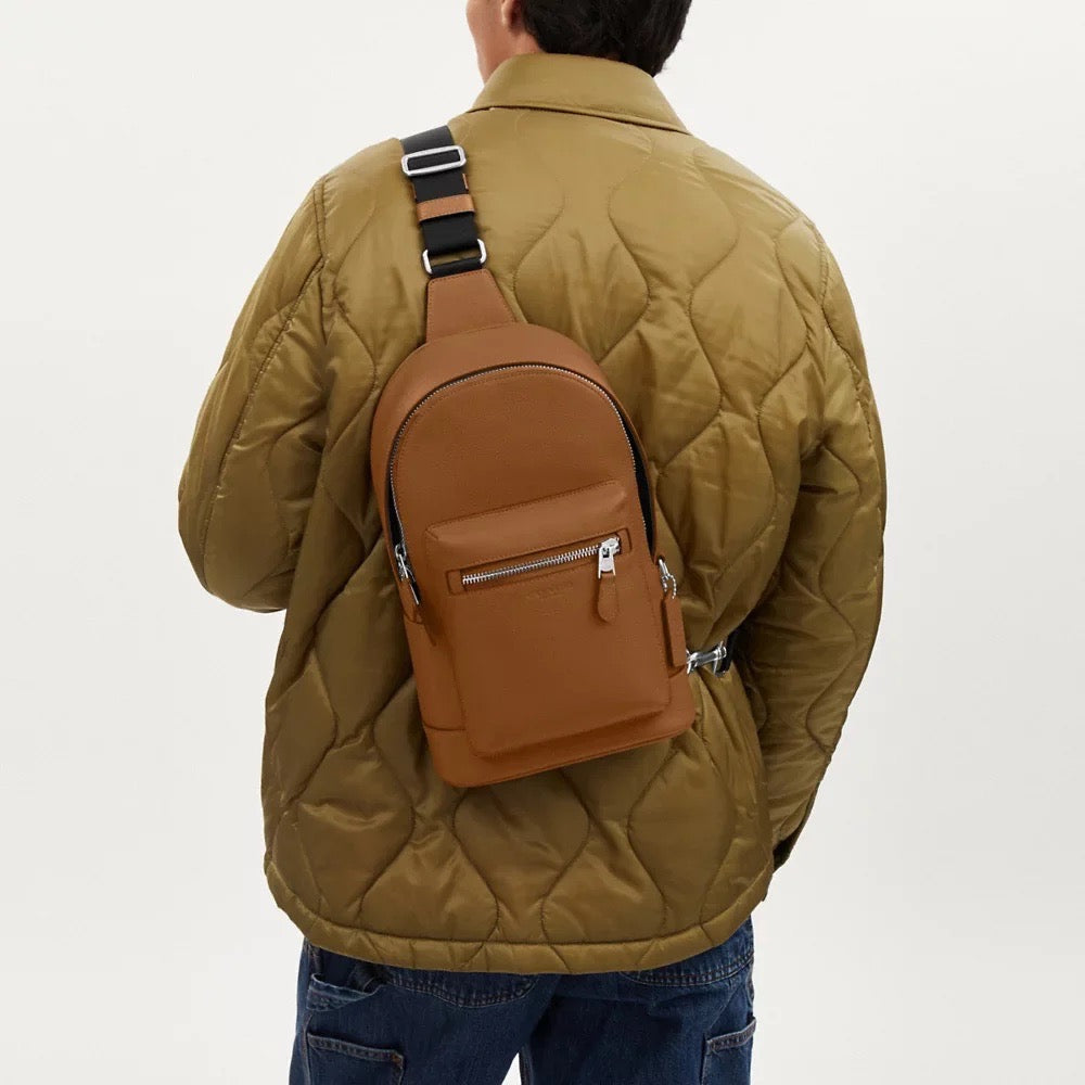 Discover Unmatched Style and Affordability with the COACH Men West Pack in Light Saddle (2540)