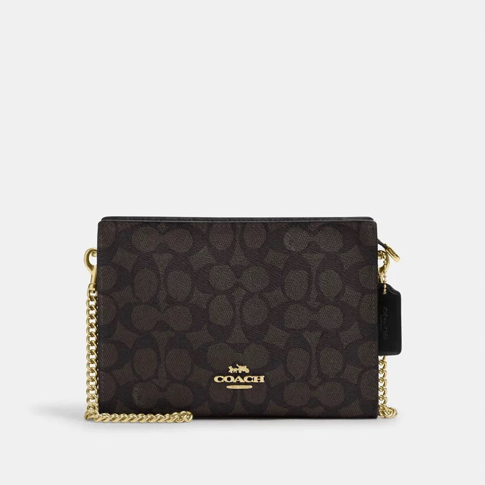 The Ultimate Accessory: COACH Slim Crossbody Bag in Signature Canvas