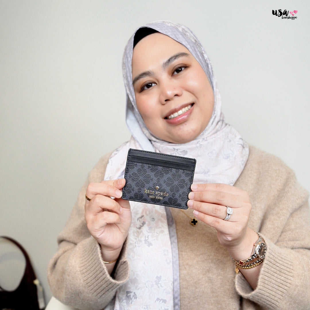 Why the Kate Spade Spade Flower Small Slim Card Holder in Black Is a Must-Have This Season