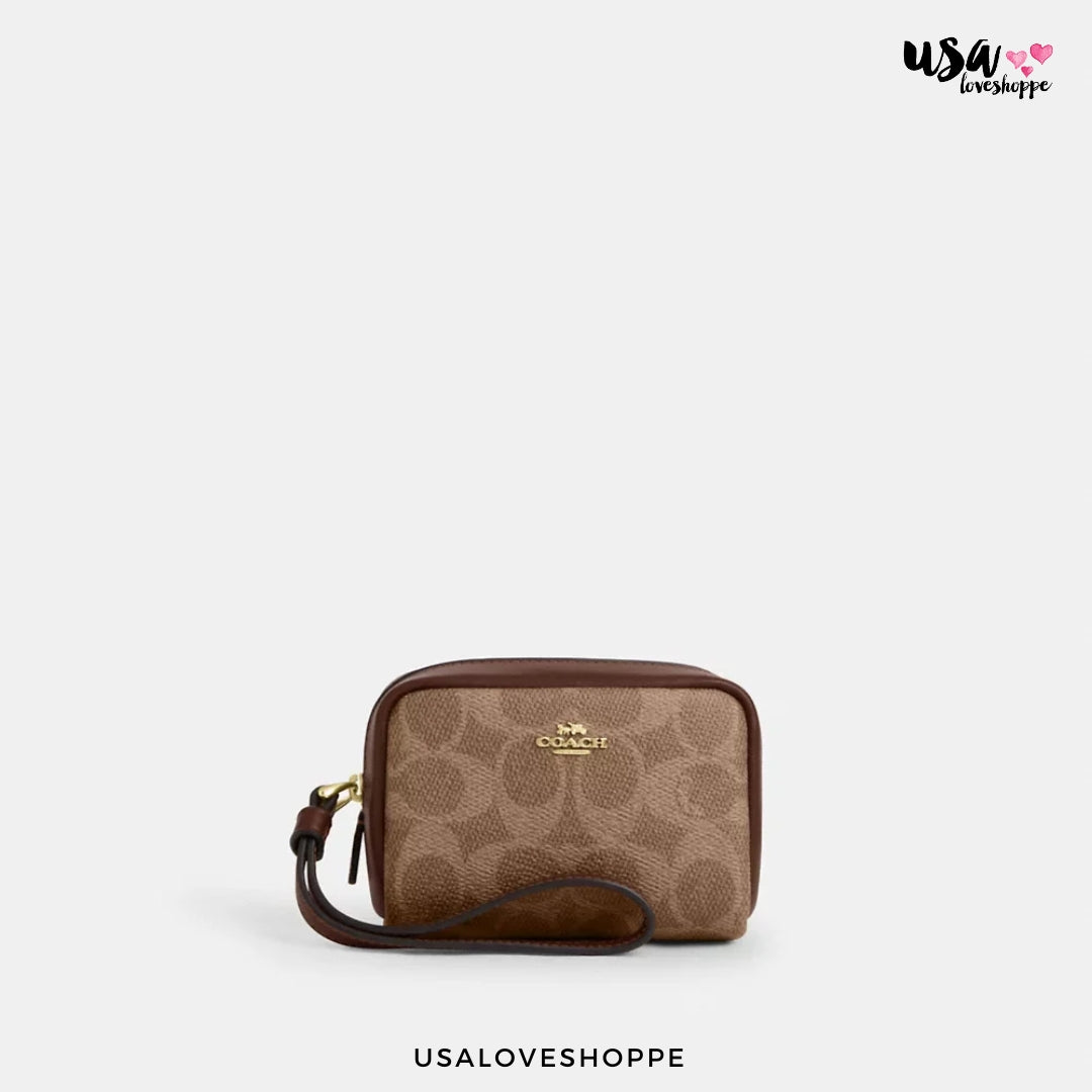Discover the Chic Elegance of the COACH Pouch Wristlet: Your Must-Have Luxury Accessory! β¨π