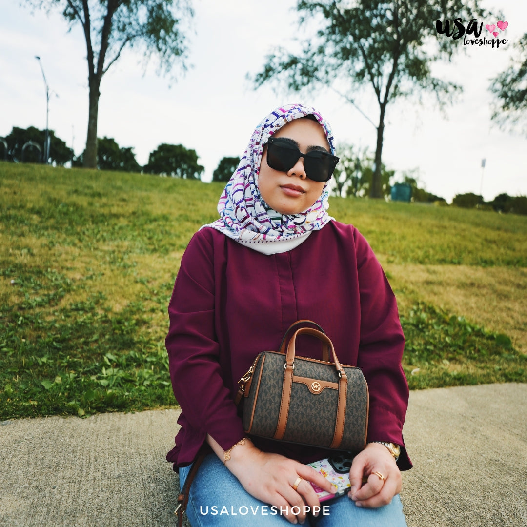 Unveiling the Charm: Michael Kors Travel Small Duffle Crossbody in Signature Brown (35S4GTFC1B)