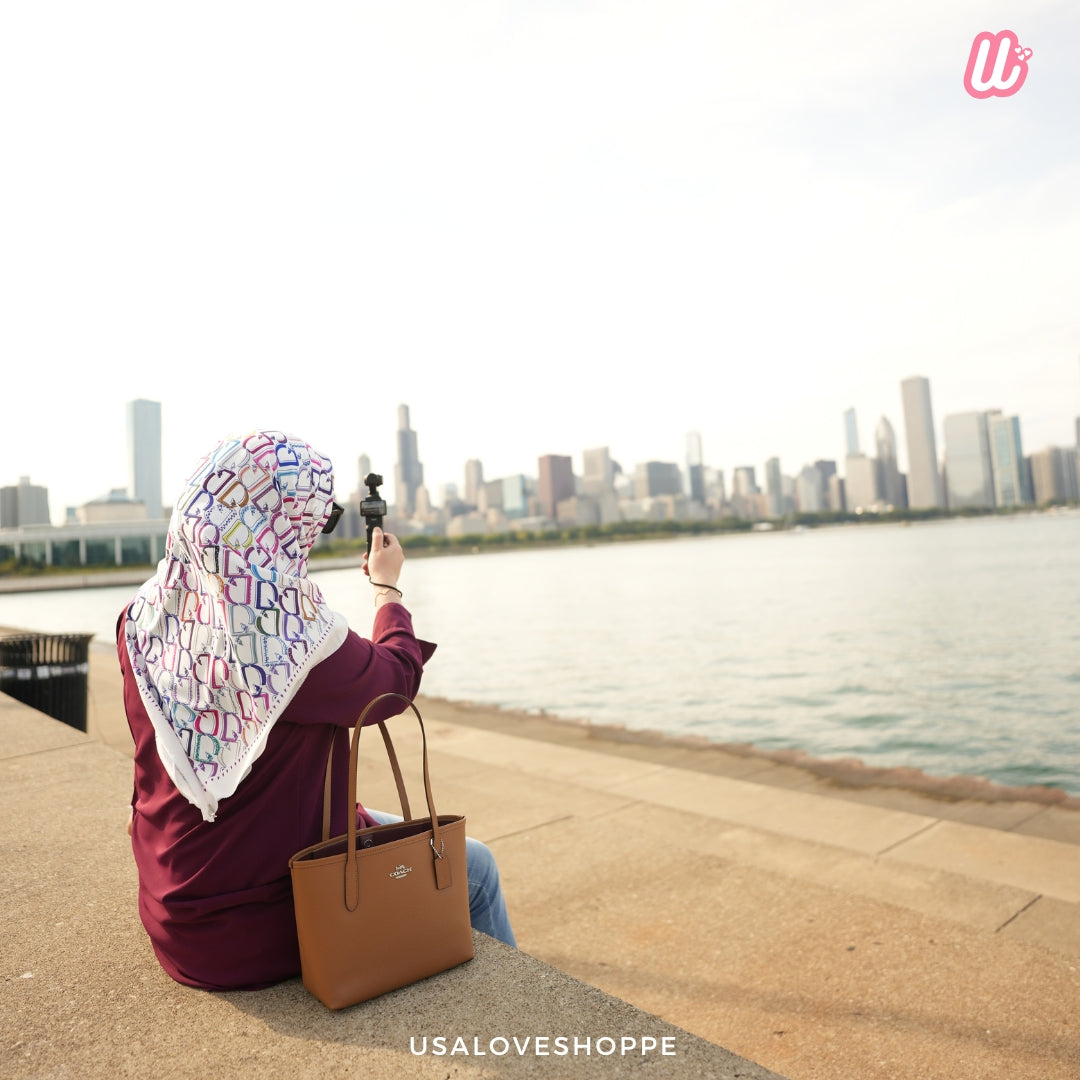 Discover the Elegance of COACH: Small City Tote in Light Saddle (CT859) – An Unbeatable Offer!