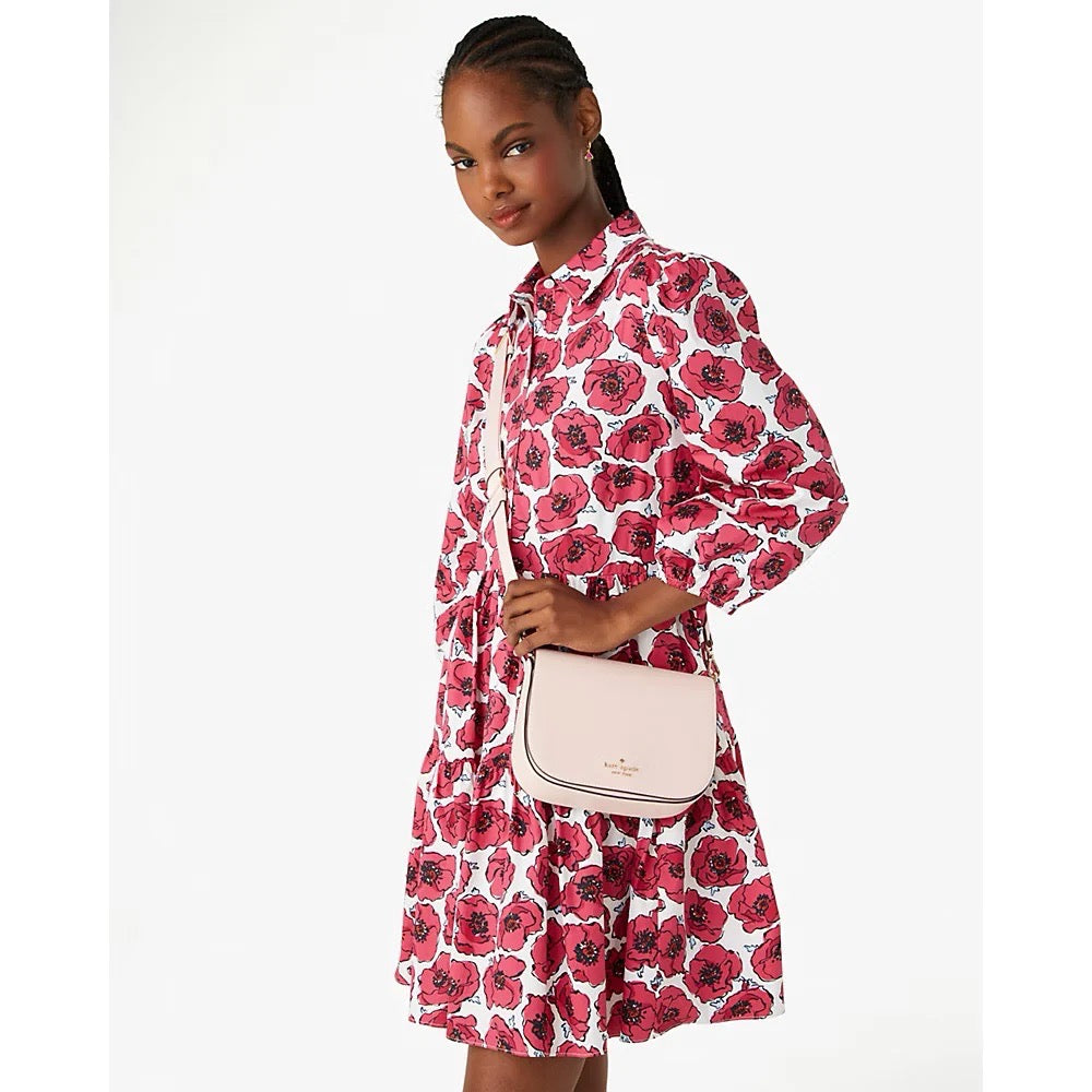 Unveil the Charm: The Kate Spade Madison Saffiano Leather Saddle Bag in Conch Pink