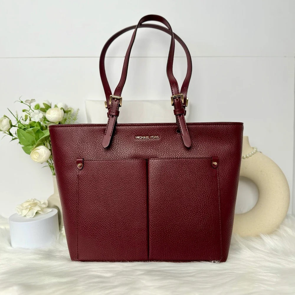Discover the Michael Kors Jet Set Travel Medium Double Pocket Tote in Oxblood Rouge Sombre: Luxury Within Reach