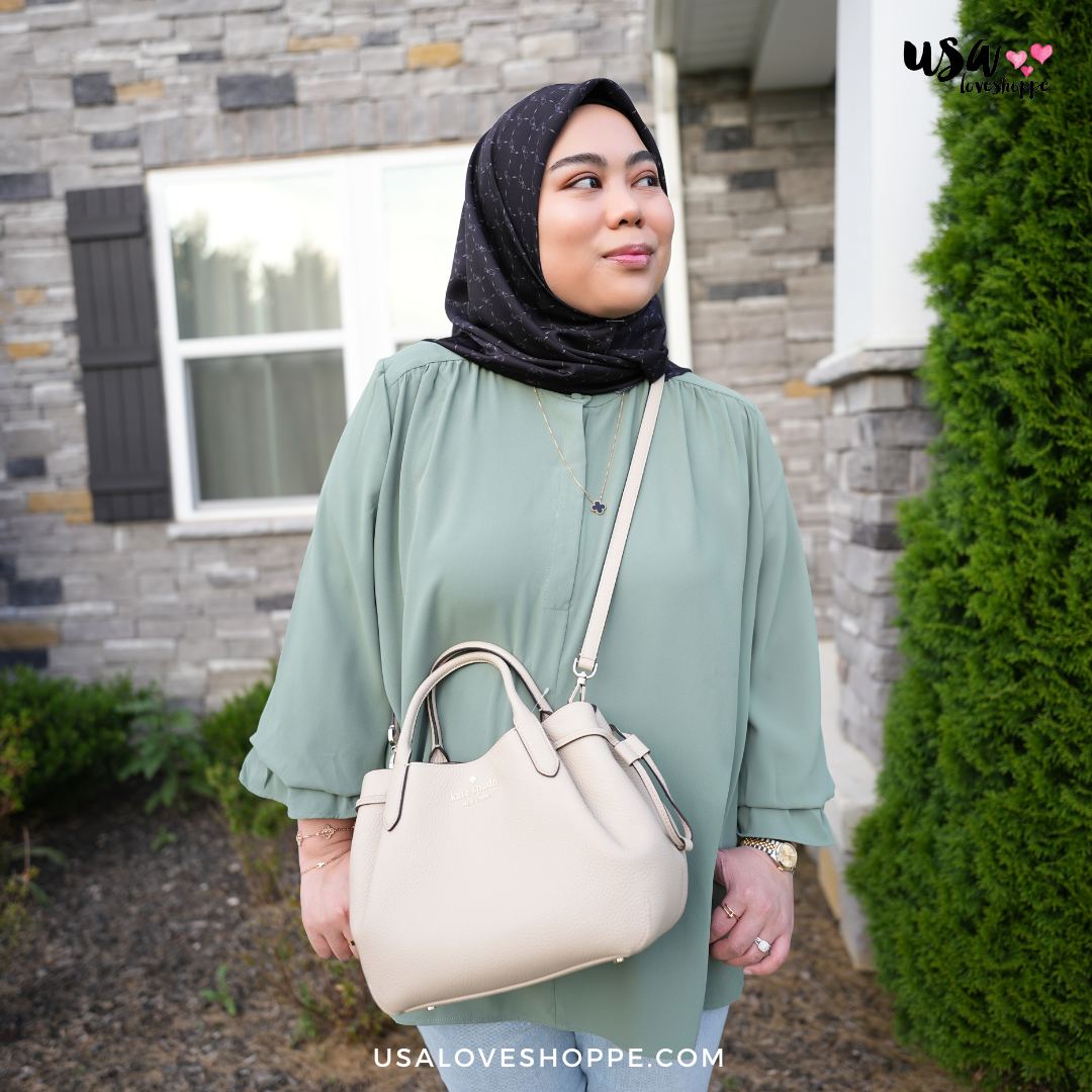 Elevate Your Style: Discover the New Light Sand Kate Spade Dumpling—A Luxurious Neutral!