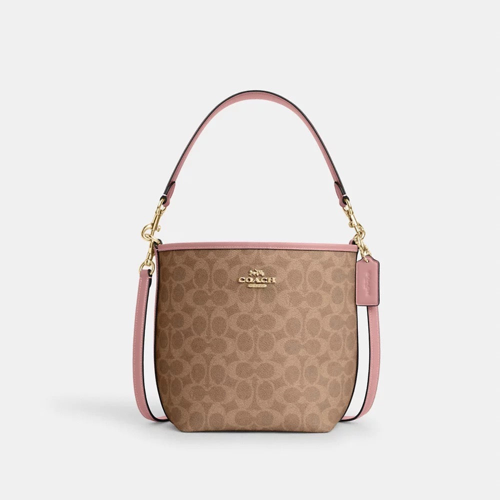 Coach bucket bag pink sale