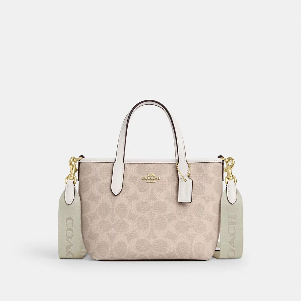 Coach Mini Surrey in signature 2024 canvas