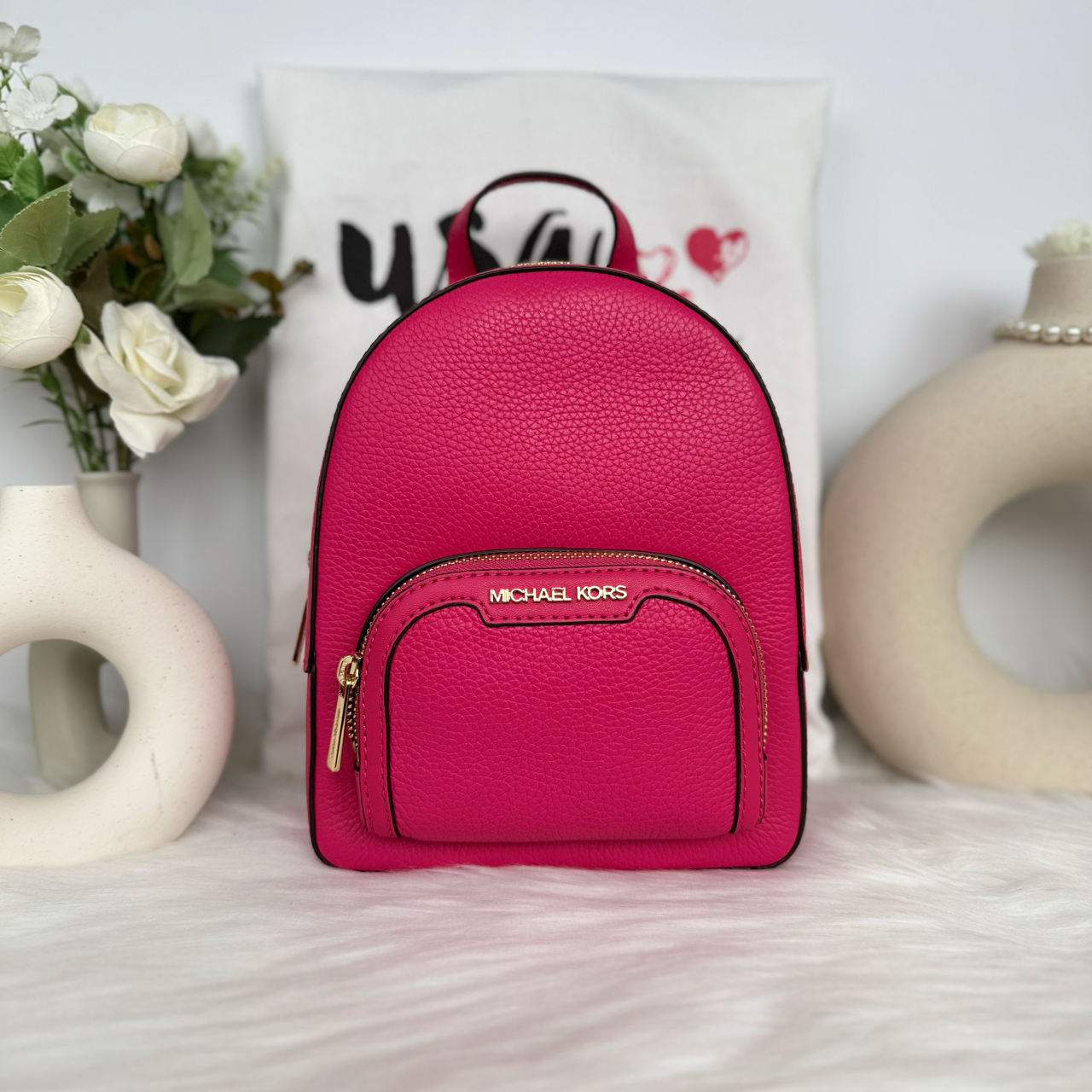 Michael kors pink backpack with flowers clearance