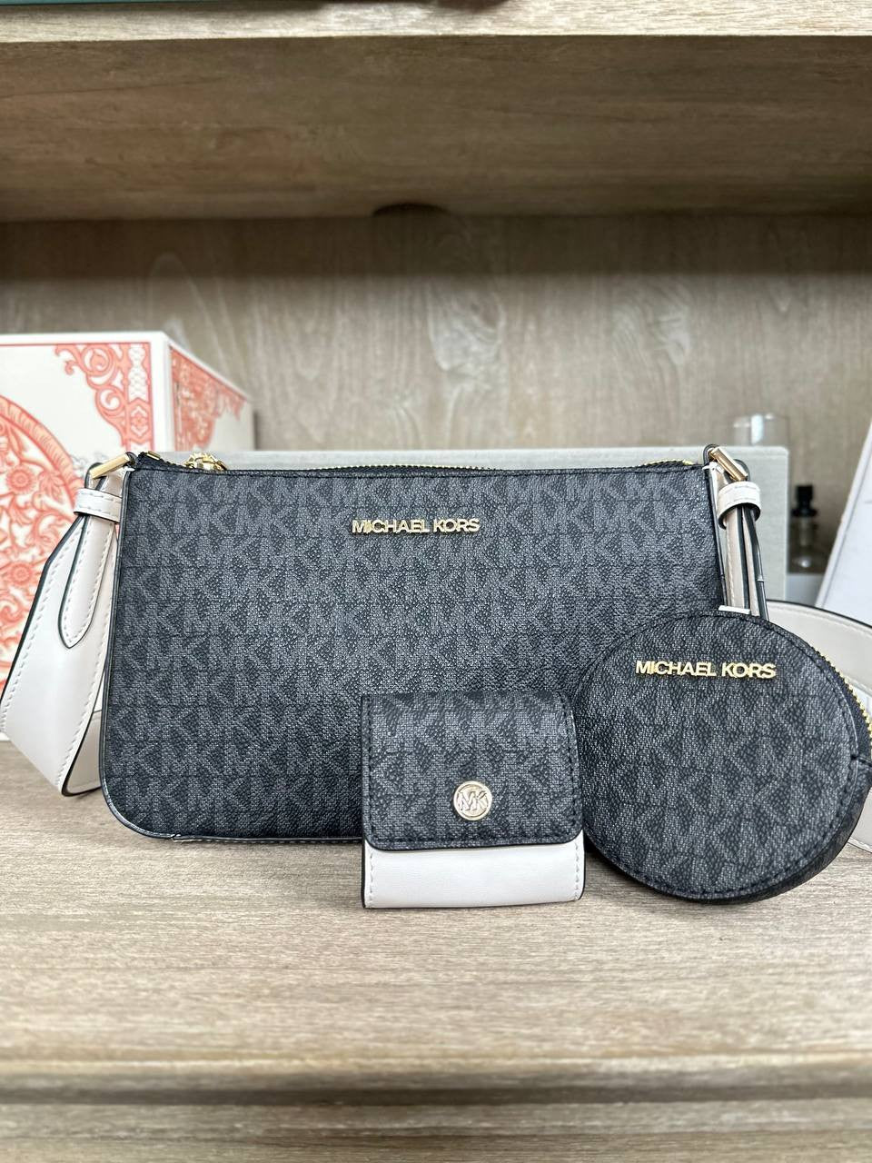 michael kors crossbody with tech attached