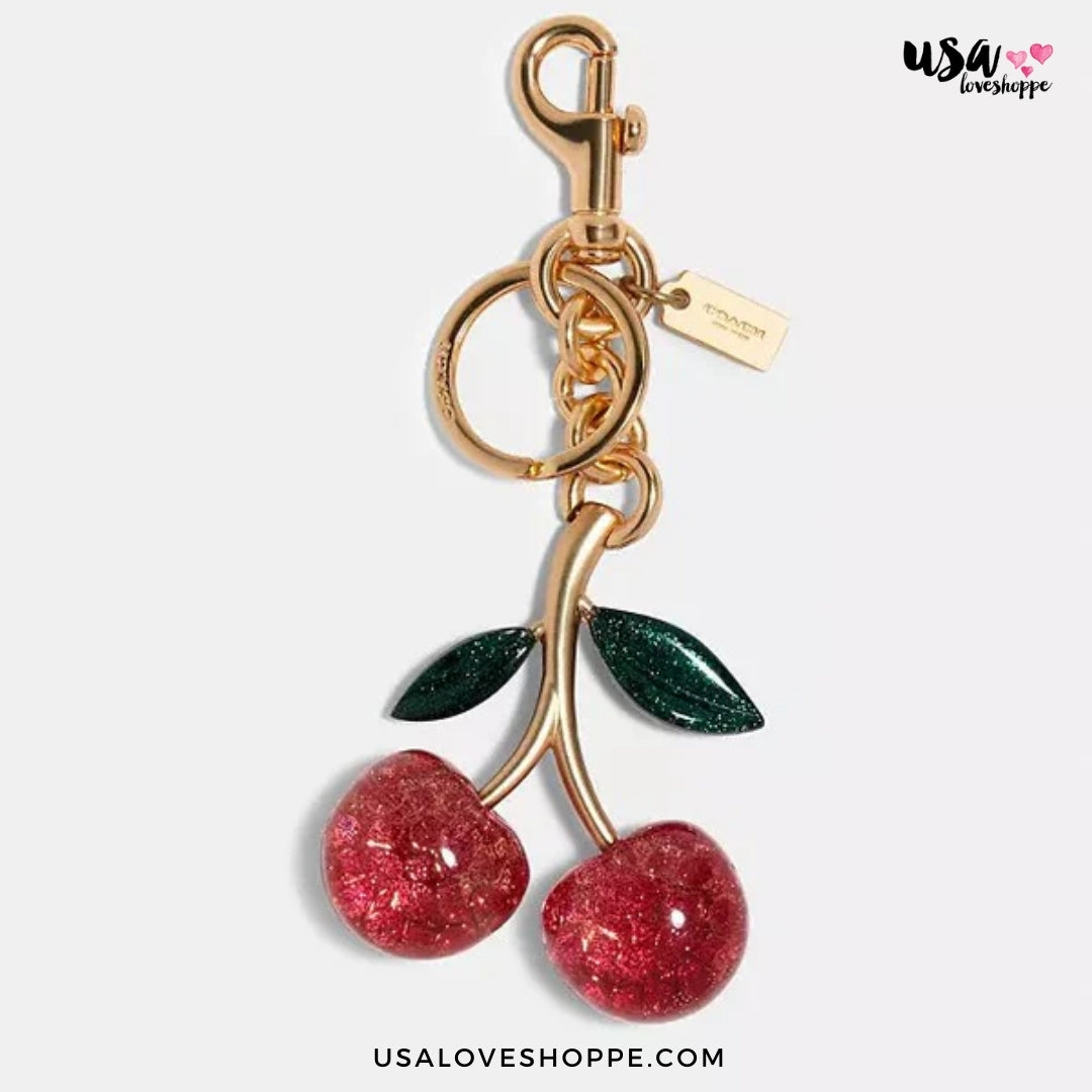 Spice Up Your Style with the Coach Signature Cherry Bag Charm - A Sweet Deal!