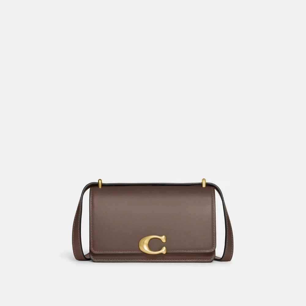 Elevate Your Style with the COACH Bandit Crossbody in Dark Stone (CD724)