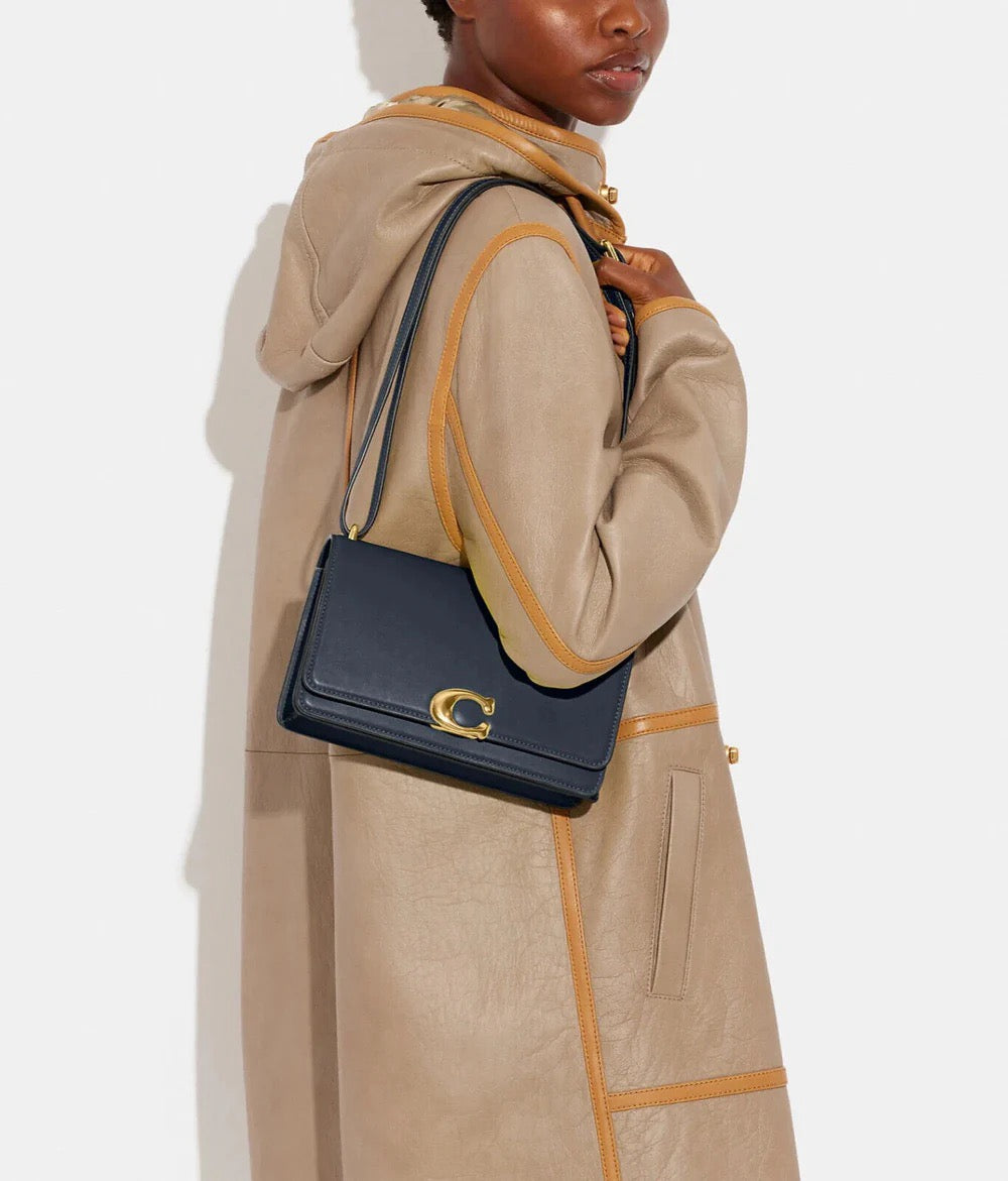 Unveiling the COACH Bandit Shoulder Bag in Denim: Style and Luxury at Unmatched Prices