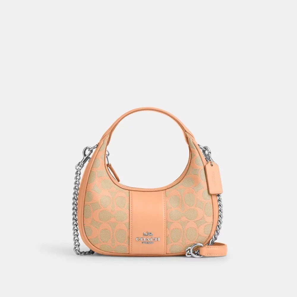 Discover the Elegance of COACH Carmen Mini Crossbody in Faded Blush – Now at Unbeatable Prices