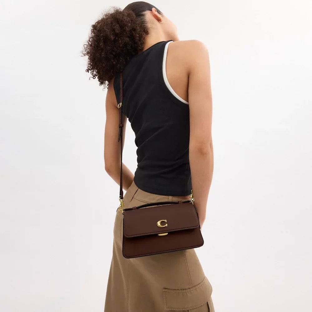 Discover the Exquisite Coach Juno Bag in Mapple – Your Perfect Companion!