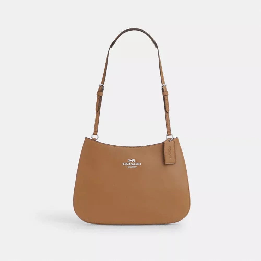 Discover Elegance with the Coach Penelope Shoulder Bag in Light Saddle - Your Ultimate Luxury Find!