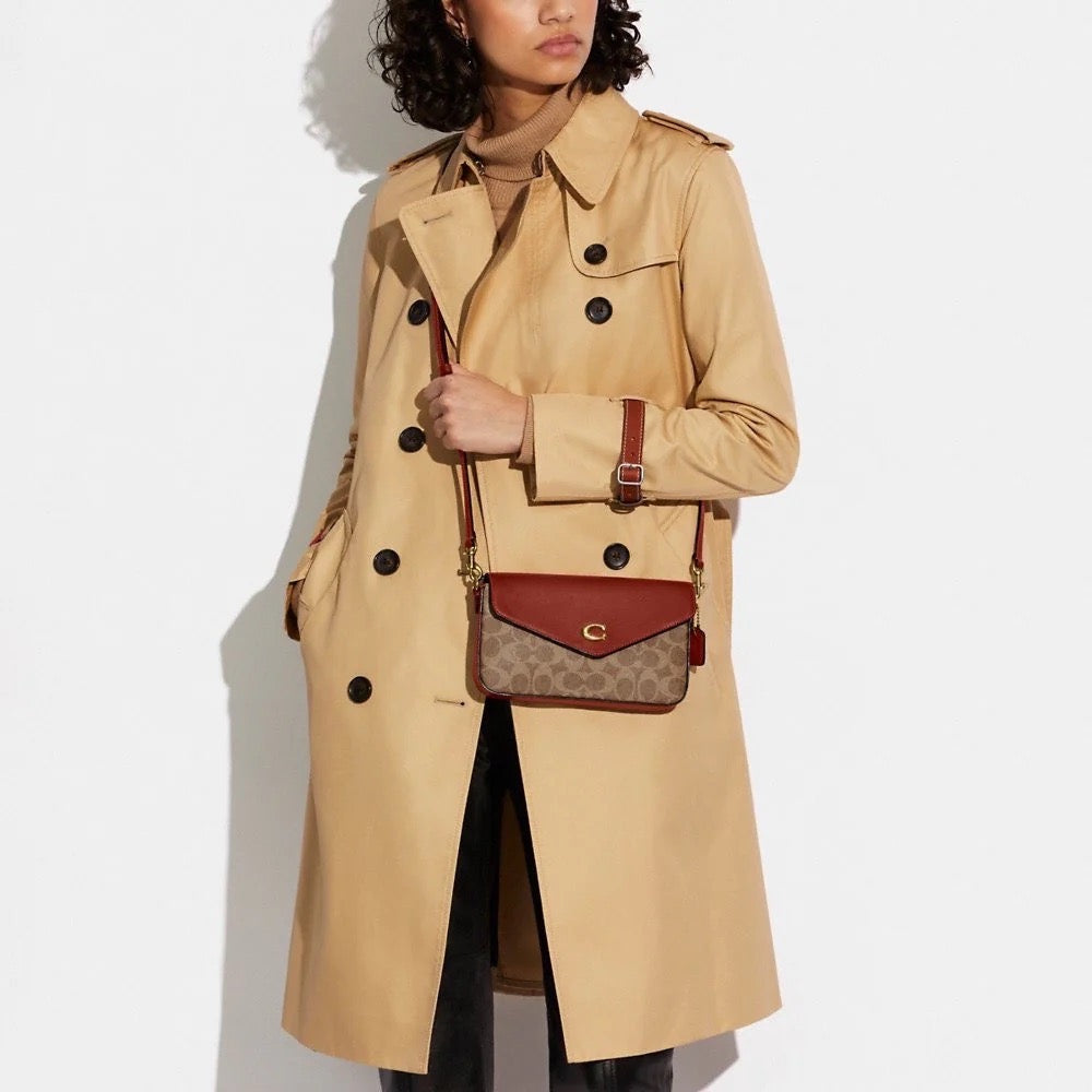 The Perfect Blend of Elegance and Practicality: Coach Wyn Crossbody in Signature Canvas in Tan/Rust (C8442)