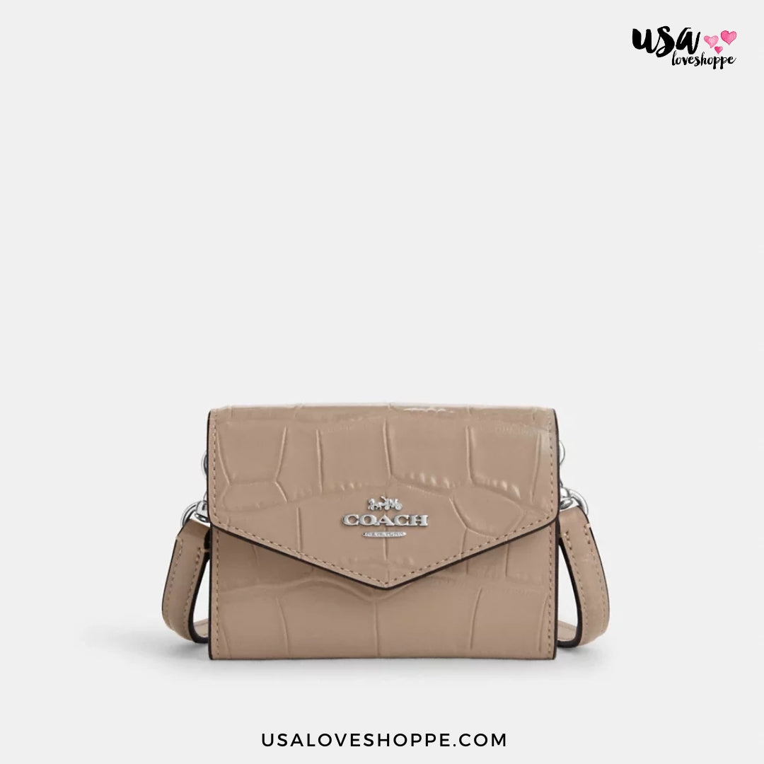 Discover Elegance with the Coach Mini Envelope Wallet - An Unbeatable Offer!