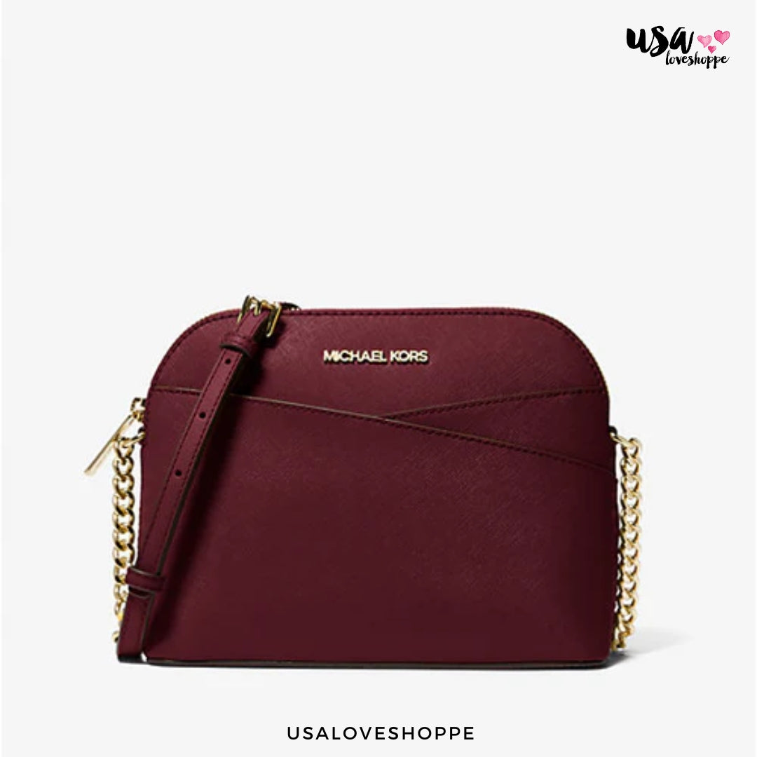 The Michael Kors Jet Set Travel Medium Dome Crossbody Bag in Oxblood: A Fashion Statement Waiting to Happen!