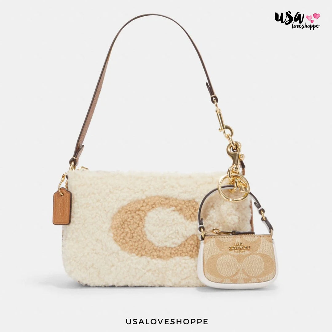 Add a Touch of Elegance to Your Look with the Coach Mini Nolita Bag Charm – A Steal from USA Love Shoppe