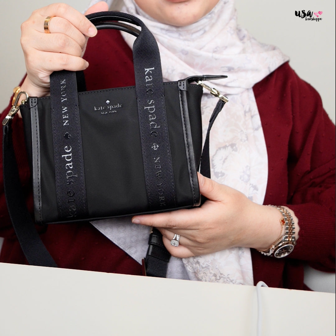 Discover this chic and versatile Kate Spade nylon mini tote — perfect for everyday elegance with a playful twist!