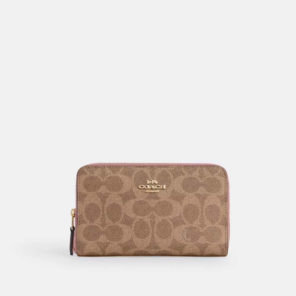 COACH Medium Id Zip Wallet In Signature Canvas in Tan Pink Petal (CW781)