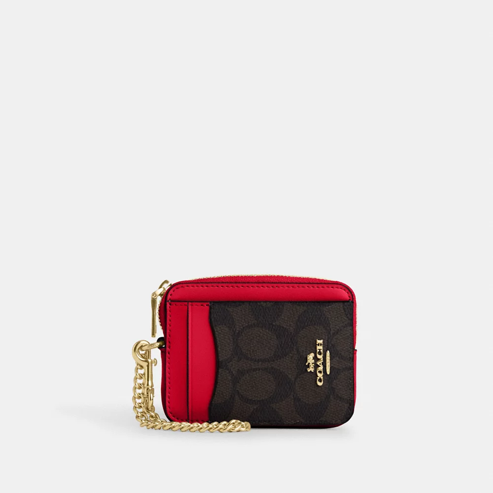 COACH Zip Card Case In Signature Canvas in Walnut/Bold Red (CW883)