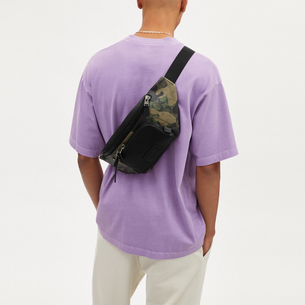 [INCOMING ETA END MAY 2024] C0ACH Track Belt Bag In Signature Canvas With Camo Print in Green Multi (CM184)