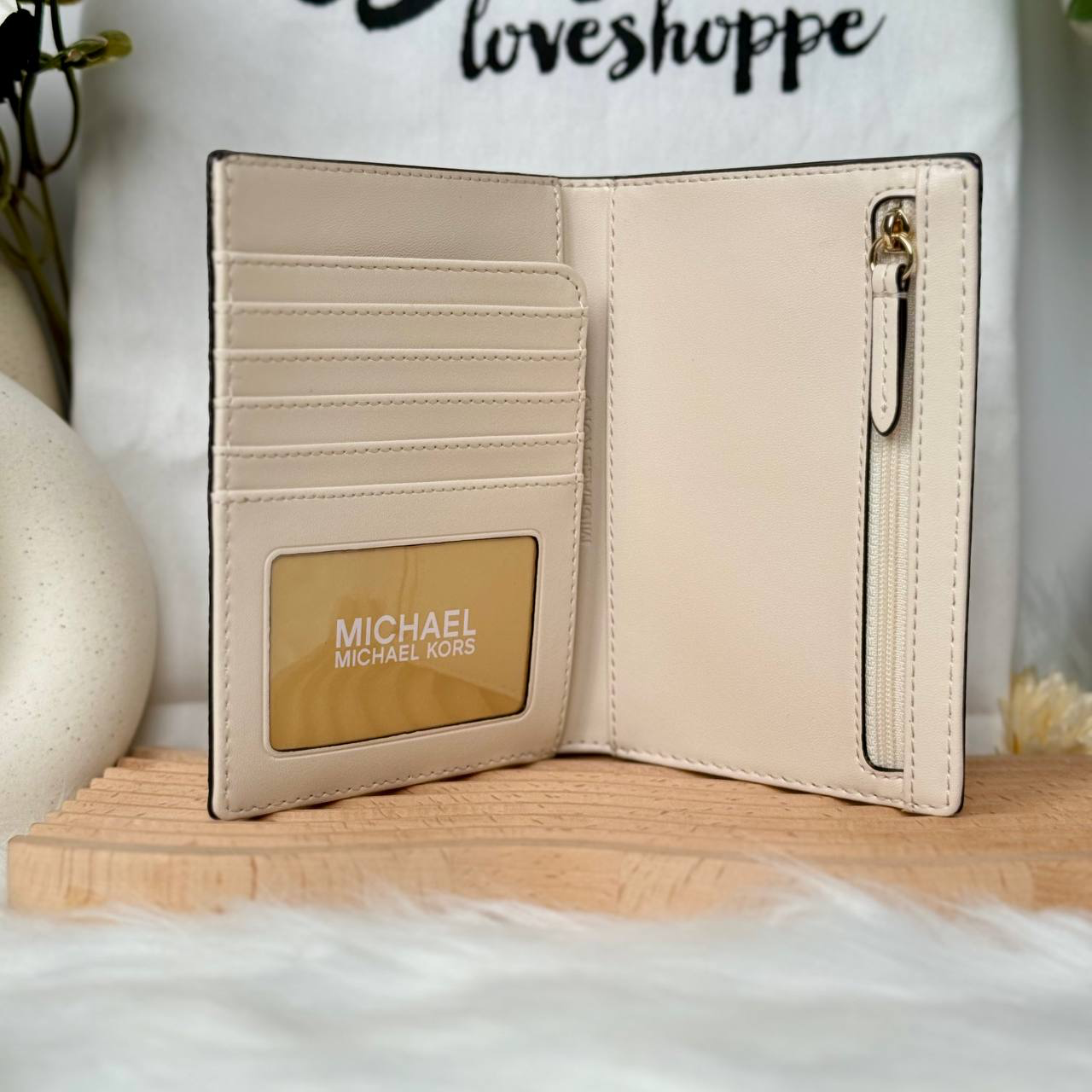 Michael Kors Logo Passport Wallet in Light Cream Multi (35F2GTVN2B)