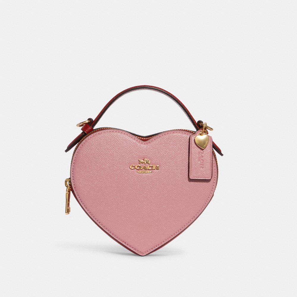 Pale pink coach purse hot sale